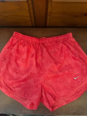 Nike Pink Coral Running Shorts with Subtle Geo Print